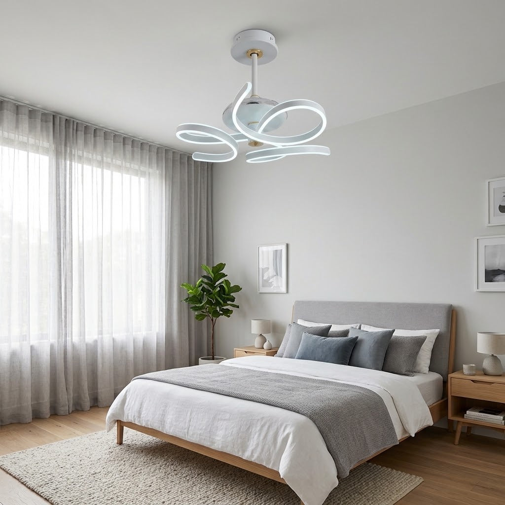 White LED ceiling fan installed above a bed in a bedroom.