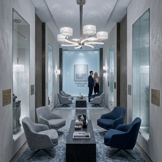 LED curved-arm pendant chandelier installed above a dining table in a modern living room with a city view.