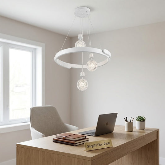 White LED ring pendant light with crystal globes installed above a home office desk.
