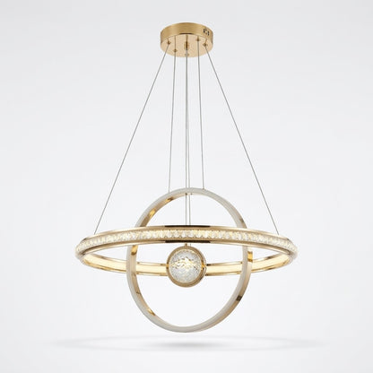 Gold LED orbital ring pendant light with a crystal-effect sphere, shown on a white background.