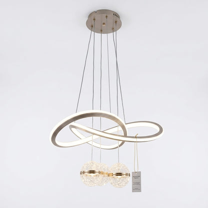 Champagne-finished LED loop pendant light with crystal globes, shown on a white background.