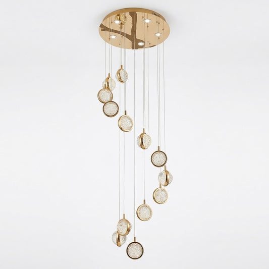 Spiral cascade crystal chandelier in gold with staggered crystal-bubble spheres, shown on a white background.