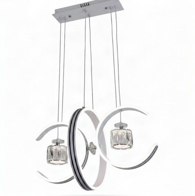 Dual crescent moon LED pendant light with two white arcs and chrome crystal shades, shown on a white background.