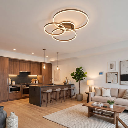 modern LED ceiling light featuring three interlocking loops in bronze