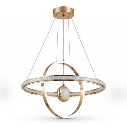 A modern LED pendant light in polished gold, featuring two interlocking illuminated rings arranged around a crystal-textured centre globe.