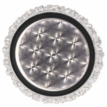 A round ceiling light featuring a silver-toned finish with a decorative crystal-like pattern across the centre.