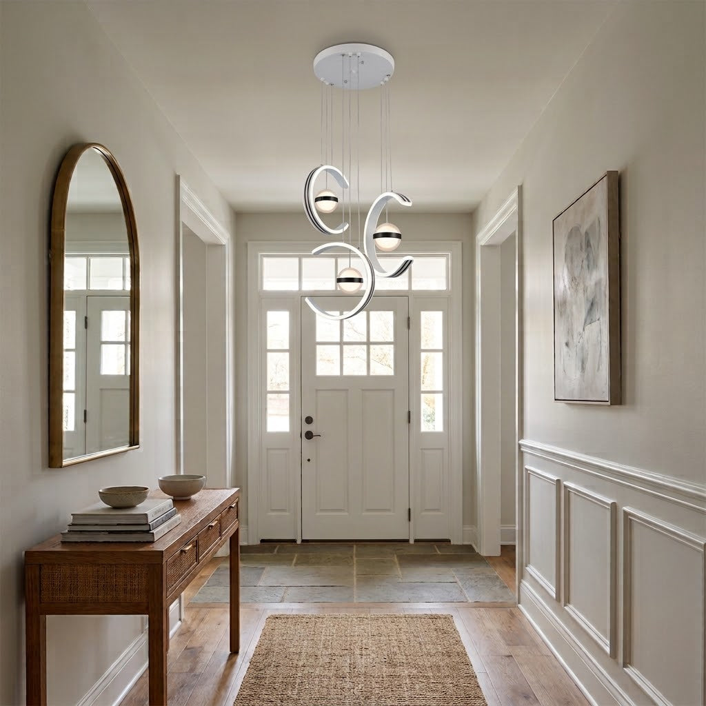 Close-up of the LED crescent moon pendant light's globe accents.