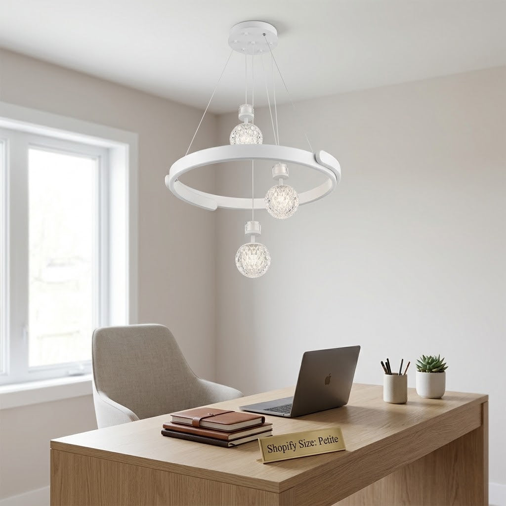 White LED ring pendant light with crystal globes installed above a home office desk.