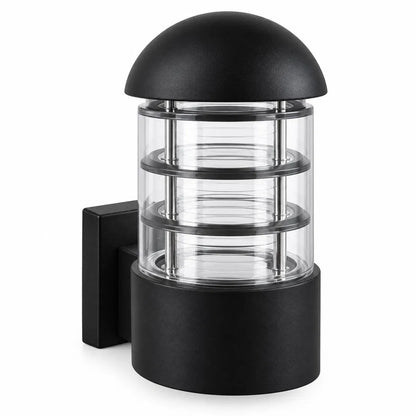 A Sunrise Lion rounded outdoor wall lantern in black aluminium and glass, with a domed cap and a ribbed cage design that casts a warm, decorative glow on the wall.