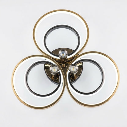 LED triple ring ceiling light in black and gold, shown on a white background.