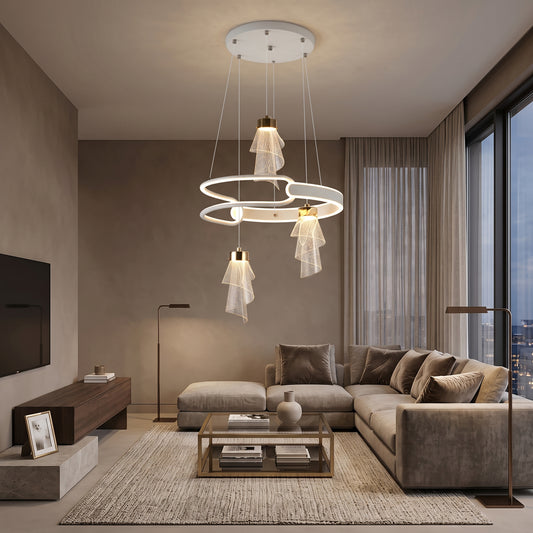 Gold LED multi-light pendant chandelier installed above a dining table.